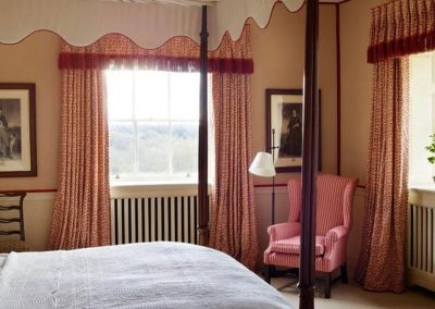 Photo of the Red Four Poster bedroom at Farleigh Wallop
