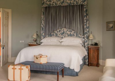 Photo of the blue four poster bedroom at Farleigh Wallop