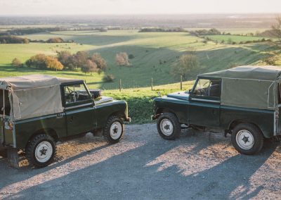 Photo of vintage Land Rovers at Goodwood's Hound Lodge