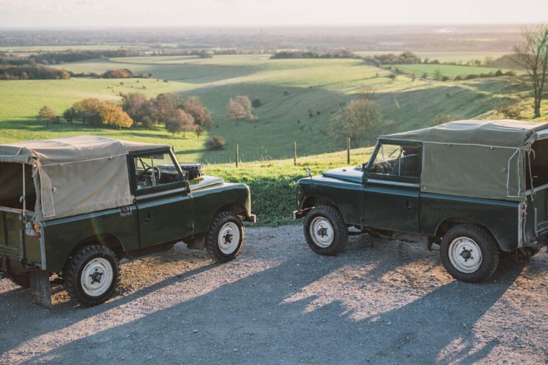 Photo of vintage Land Rovers at Goodwood's Hound Lodge