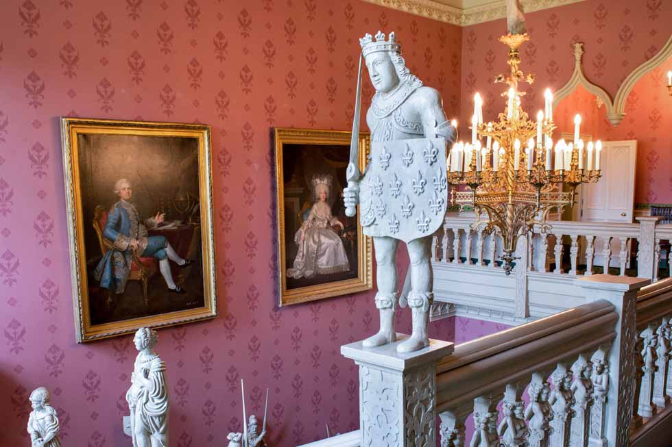 One of the statues on the stair well Image fo the statues in Hartwell House