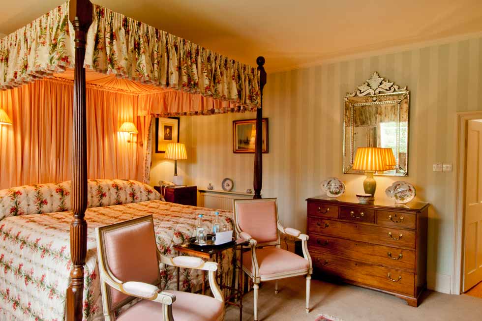 One of the four poster bedrooms Image of one of the four poster bedrooms