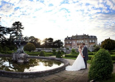 Photo of a wedding by the Luton Hoo pond