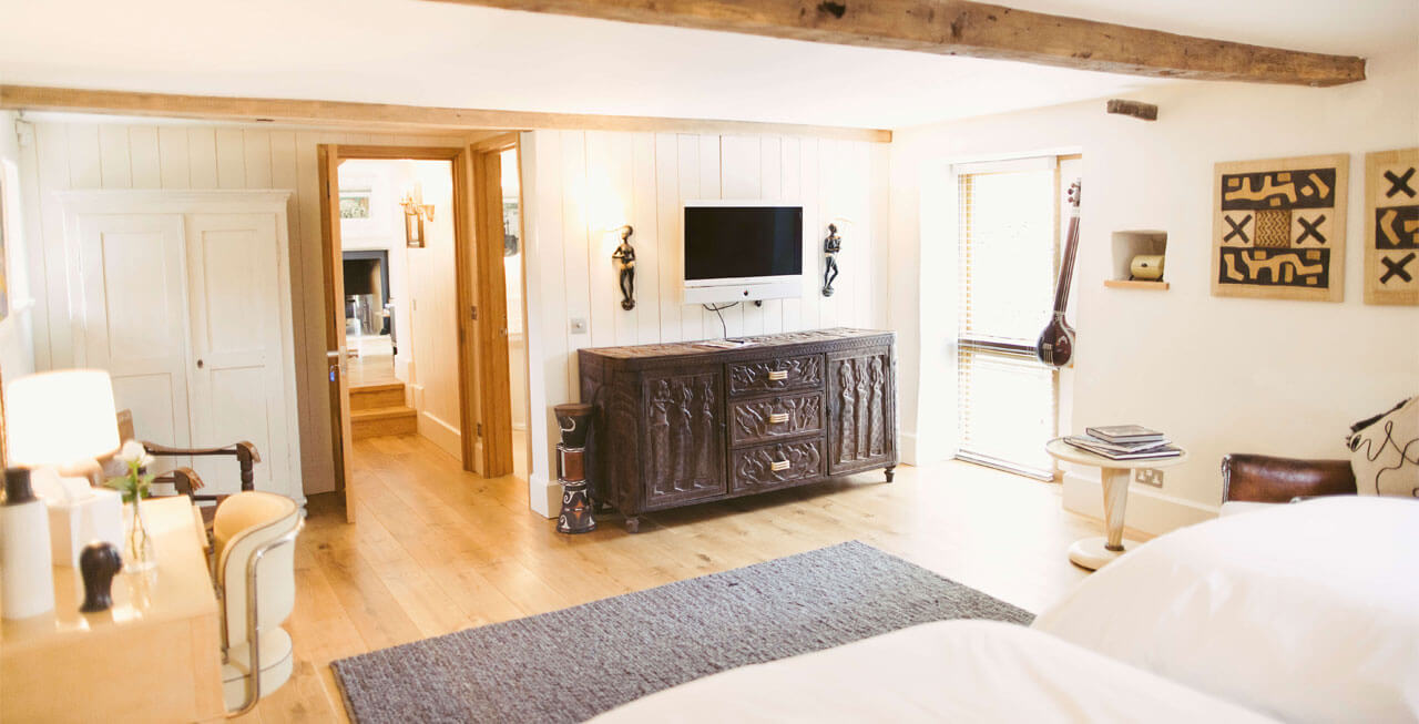 Photo of one of the bedrooms at Temple Guiting Estate