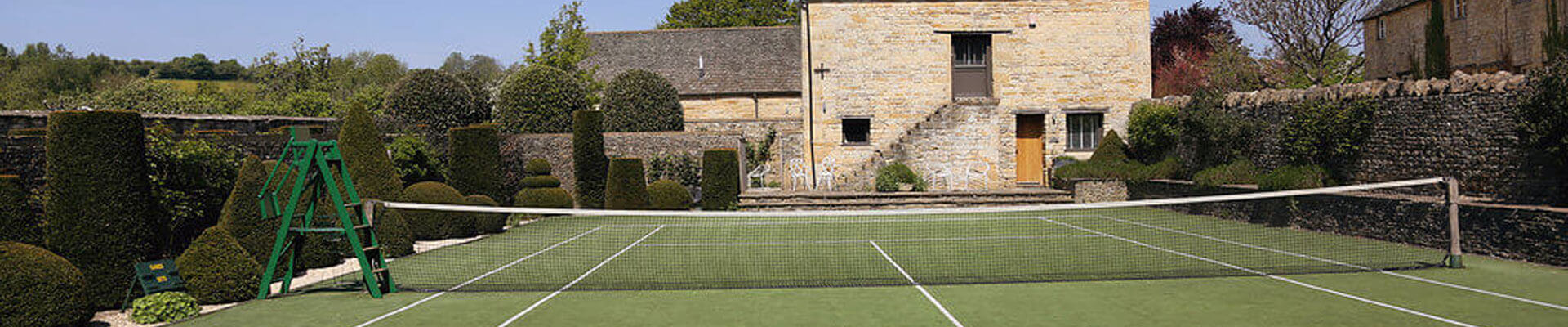 The tennis court at Temple Guiting Estate Photo of the tennis court at Temple Guiting Estate