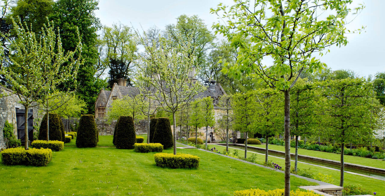 Photo of the gardens at Temple Guiting Manor