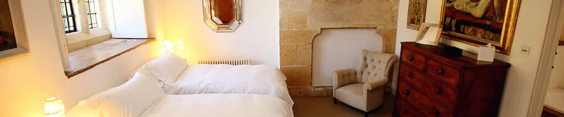 One of the bedrooms at Temple Guiting Manor Photo of one of the bedrooms at Temple Guiting Manor