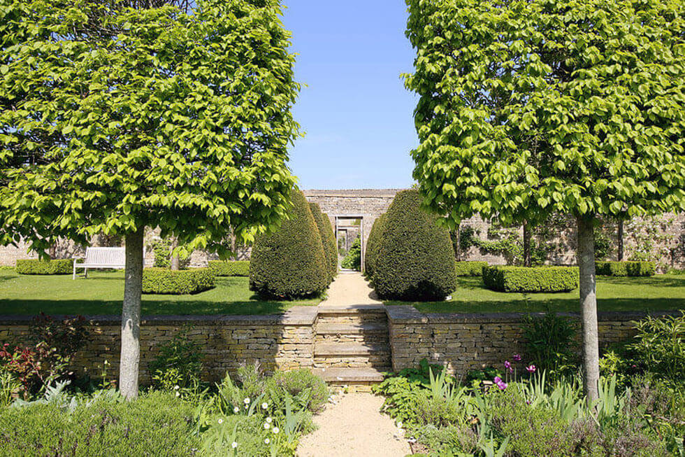 Some of the stunning gardens at Temple Guiting Manor Photo of some of the stunning gardens at Temple Guiting Manor