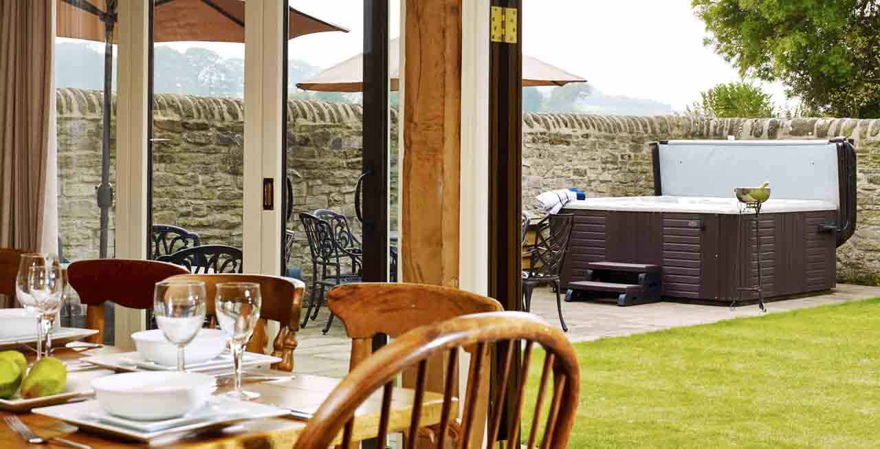 Enjoy your time at The Barns in one of the hot tubs Enjoy your time at The Barns in one of the hot tubs